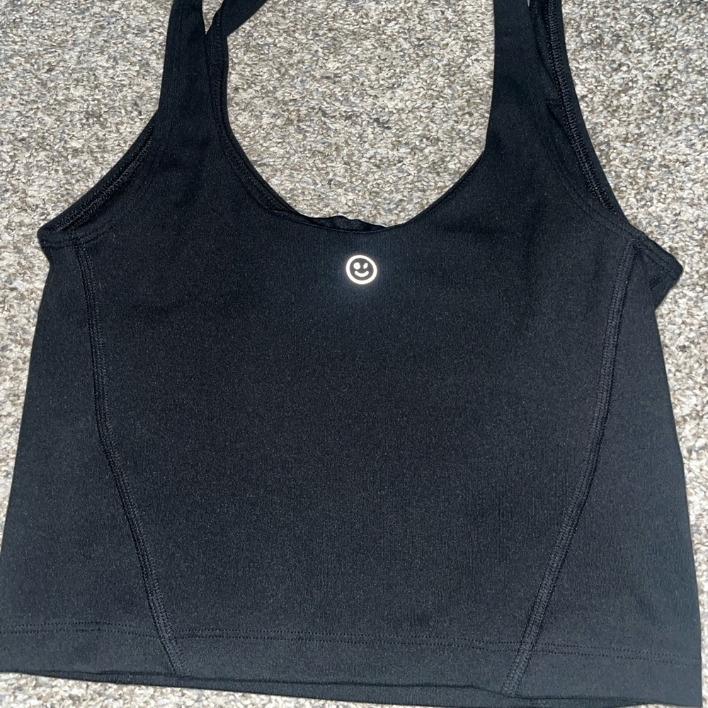 Black gilly hicks workout top. Very flattering and never worn